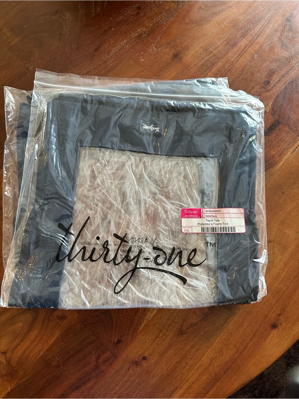 thirty-one top-a-tote lid with navy Trim